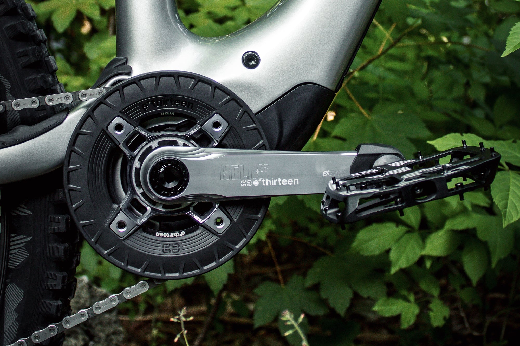 A Turbocharger Race bashguard and chainring fitted to an e-bike
